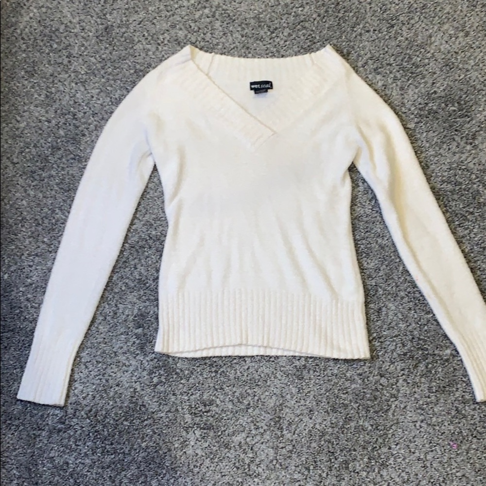 White v-neck long sleeve.